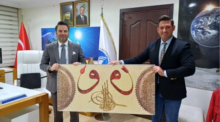  nsan Aykut Saban, SASK Genel Mdr Yiit Turan', baarlarndan dolay tebrik etti