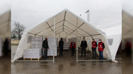 MÜSİAD'dan bin koli erzak yardımı